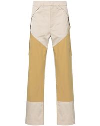 Roa - Panelled Cargo Trousers - Lyst