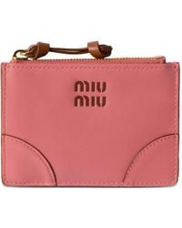 Miu Miu - Cartera con logo en relieve - Lyst