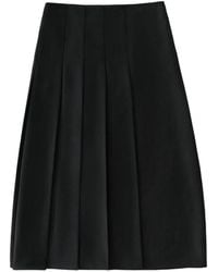 Studio Nicholson - Asymmetric Pleated Skirt - Lyst