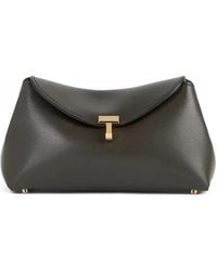 TOTEME - Mini T-Lock Leather Clutch Bag - Lyst