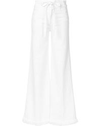 FRAME Distressed High-rise Flared Jeans - White