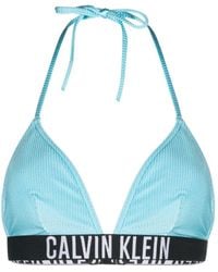 Calvin Klein - Top bikini con banda logo - Lyst