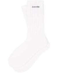 Sporty & Rich - Logo-Embroidered Ribbed Socks - Lyst