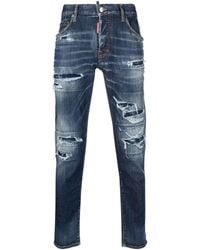 DSquared² - Jeans a cinque tasche 'skater' con strappi ed effetto bleach in denim di cotone stretch azzurro - Lyst