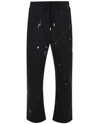 DOMREBEL - Paint-Splatter Logo-Print Track Pants - Lyst