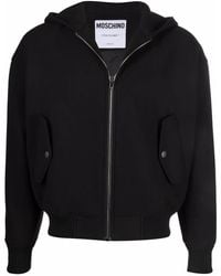 Moschino - Logo-appliqué Zipped Hoodie - Lyst