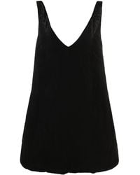 KHAITE - Vestido con cuello en V - Lyst