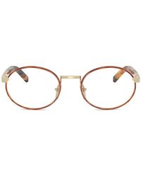 Prada - Brille Mit Rundem Gestell - Lyst