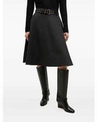 Ganni - Falda midi acampanada con cinturón - Lyst