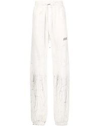 Amiri - Cracked-Print Track Pants - Lyst