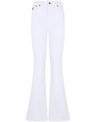 Lois - Logo-Patch Flared Jeans - Lyst