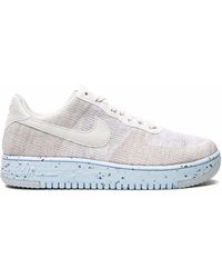 Nike Air Force 1 Flyknit Low Sneakers for Men - Up to 19% off | Lyst