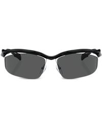 Prada - Prada PR A25S Sonnenbrille mit geometrischem Gestell - Lyst