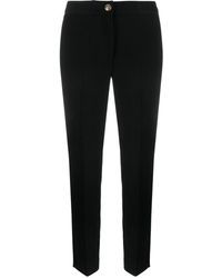 Versace - Logo-waistband Slim Trousers - Lyst