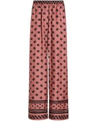 Dolce & Gabbana - Silk Logo Print Wide-Leg Trousers - Lyst