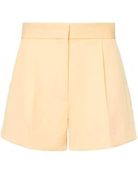 Sandro - Pleated Cotton Tailored Shorts - Lyst
