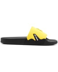 Raf Simons - Sandali slides con logo goffrato - Lyst