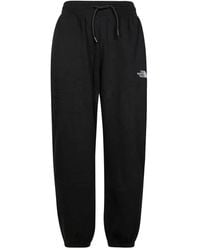 The North Face - Pantalones de chándal con cintura elástica y bajos ajustados - Lyst