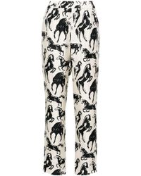 Balmain - Horse-print Silk Tapered Trousers - Lyst