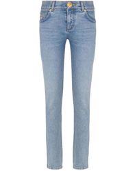 Balmain - Faded-Wash Button-Embellished Jeans - Lyst