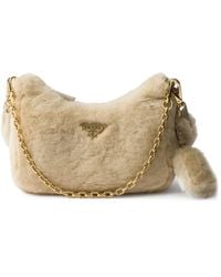 Prada - Re-Edition Mini-Tasche aus Shearling - Lyst