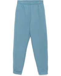 Lacoste - Logo-Embossed Fleece Pants - Lyst