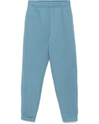 Lacoste - Logo-Embossed Fleece Pants - Lyst