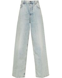 Valentino Garavani - Logo-plaque Cotton Wide-leg Jeans - Lyst