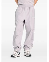 New Balance - Trackside Woven Track Pants - Lyst