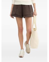 Guess - Logo-Plaque Seamed Shorts - Lyst