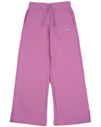 Nike - Phoenix Trainingsbroek Met Wijde Pijpen - Lyst