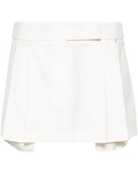 Nissa - Minifalda plisada de talle bajo - Lyst
