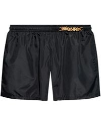 Moschino - Bañador con placa del logo - Lyst