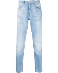Tommy Hilfiger - Tief sitzende Slim-Fit-Jeans - Lyst