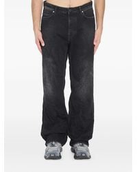 Balenciaga - Logo-Patch Distressed Jeans - Lyst