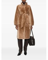 Suprema - X Eraldo Belted Shearling Coat - Lyst