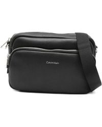 Calvin Klein - Logo-Lettering Cross Body Bag - Lyst