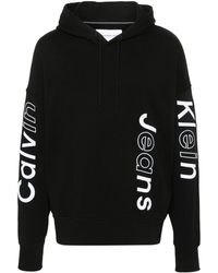 Calvin Klein - Calvin klein logo-embroidered cotton hoodie - Lyst