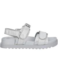 Guess - Fadison Sandalen im Metallic-Look - Lyst