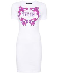 Versace - Robe en coton à logo imprimé - Lyst