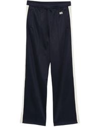 Wales Bonner - Logo-Embroidered Striped Track Pants - Lyst