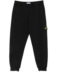 Stone Island - 6200012 Geborstelde Biologisch Katoenen Fleece Joggingbroek Met Geribbelde Zoom - Lyst