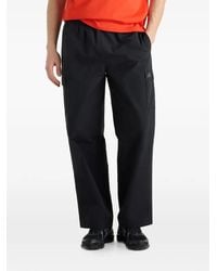 New Balance - Logo-Detail Cargo Pants - Lyst