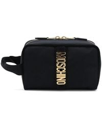 Moschino - Logo-Plaque Clutch Bag - Lyst