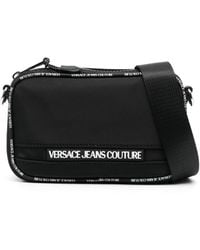 Versace - Logo-embossed Messenger Bag - Lyst