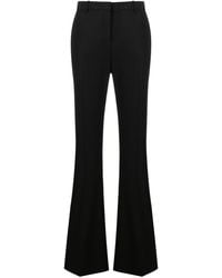 Versace - Virgin Wool Flared Trousers - Lyst