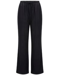 Toccin - Nela Drawstring Flared Trousers - Lyst