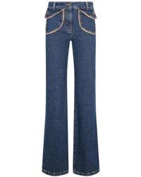 Moschino - Scalloped-Trim Flared Jeans - Lyst