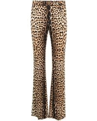 Roberto Cavalli - Pantalones slim con estampado de leopardo - Lyst