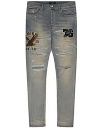 Amiri - Varsity Eagle Logo-Patch Jeans - Lyst